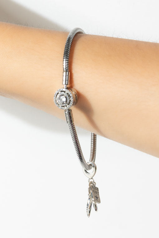 Pulsera Paloma plateada con dije