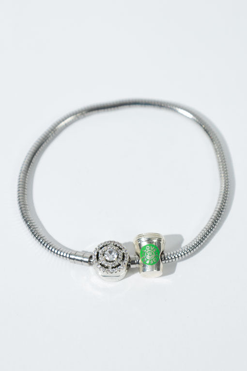Pulsera Paloma plateada con dije