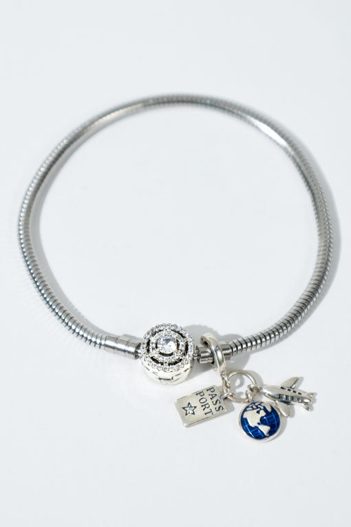 Pulsera Paloma plateada con dije